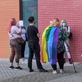 Protesters chant 'trans rights are human rights' outside the University of Portsmouth's Richmond Building.
