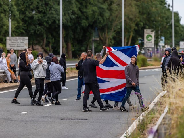 The M275 is brought to a standstill by Anti-immigration protesters. Picture: Mike Cooter (070824)