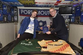 Aaron Haggard from Gosport, has won the Best Games Room 2023 award in the Home Leisure Direct competition. He was presented the plaque by his childhood hero and Blues legend Alan Knight. Pictured is: (right) Alan Knight with Aaron Haggard.

Picture: Sarah Standing (111223-3258)