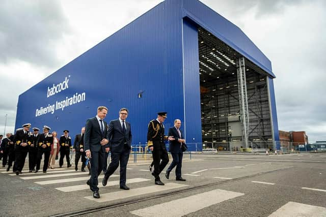 Royal Navy leaders and military chiefs join defence secretary Ben Wallace, pictured front right, in Scotland to mark the first cutting of steel on the Type 31 in September, 2021. Photo: MoD