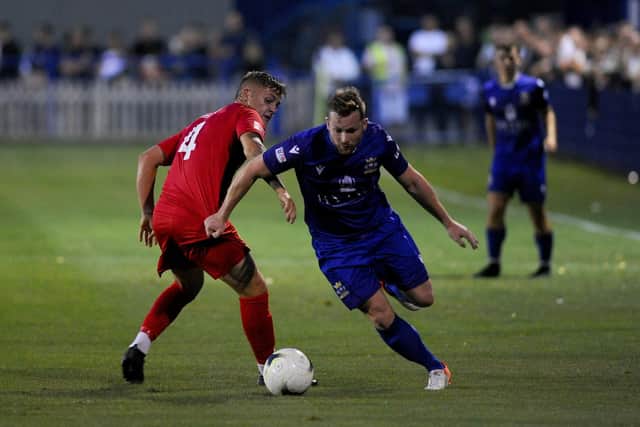 Baffins' Miles Everett in FA Cup action against Winchester City. Picture: Sarah Standing