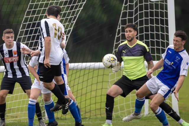 Hayling's George Gregory (10) looks for a way through. Picture: Alex Shute.