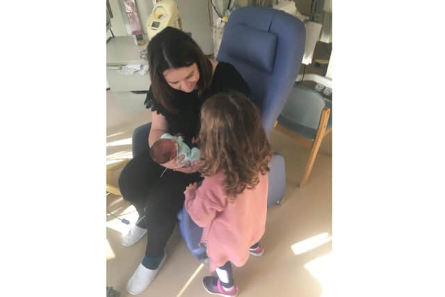 Kirsty with newborn Brody and sister Maisy last year