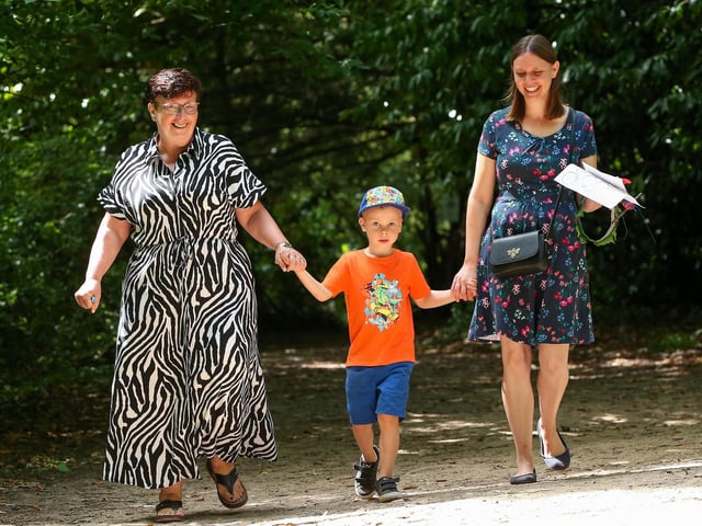 Angela Larkman, Thomas, 5, and his mother, Kay Larkman enjoy a stroll in the sun at Holly Hill Woodland Park.Picture: Chris  Moorhouse (140824-06)