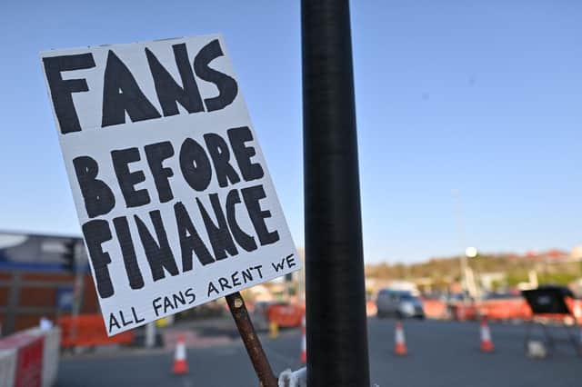 A picture shows a placard with a message against plans for a European Super League outside Elland Road ahead of the English Premier League football match between Leeds United and Liverpool in Leeds, northern England, on April 19, 2021. Picture: PAUL ELLIS/AFP via Getty Images