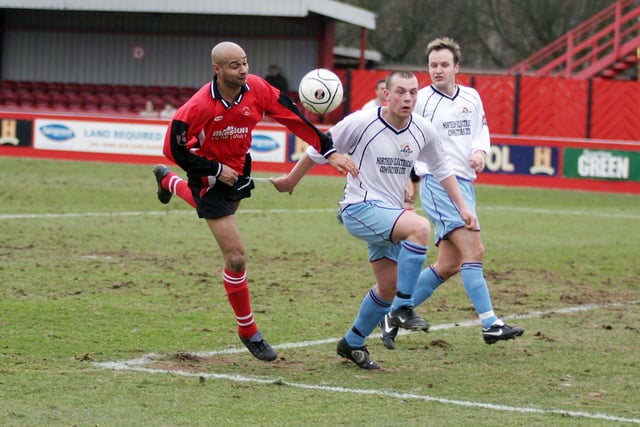 Martin Carruthers chases the ball in the President's Cup tie with Mossley.