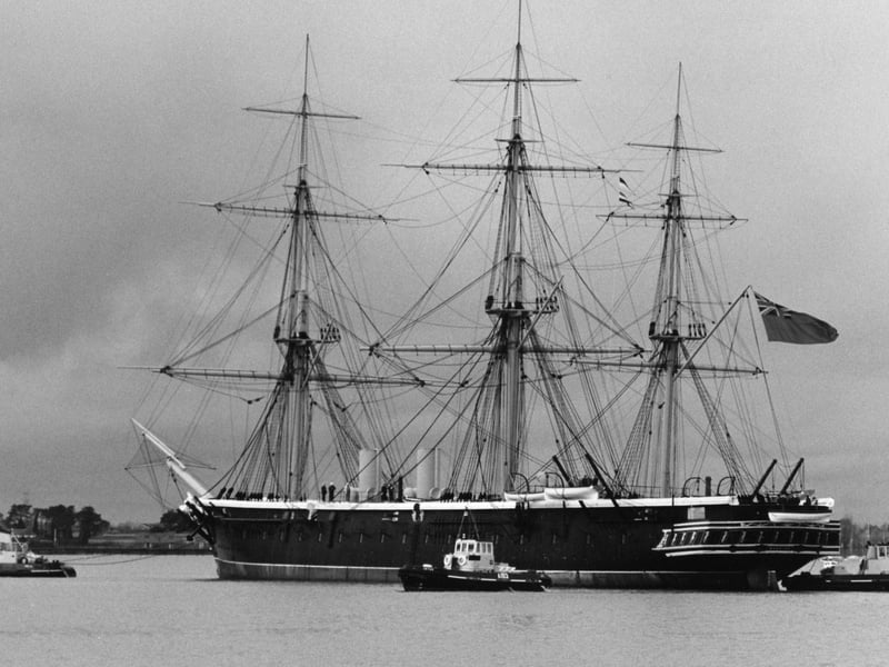 HMS Warrior is eased into her dock at Portsmouth naval base for an inspection of her hull in January 1994. The News PP4331