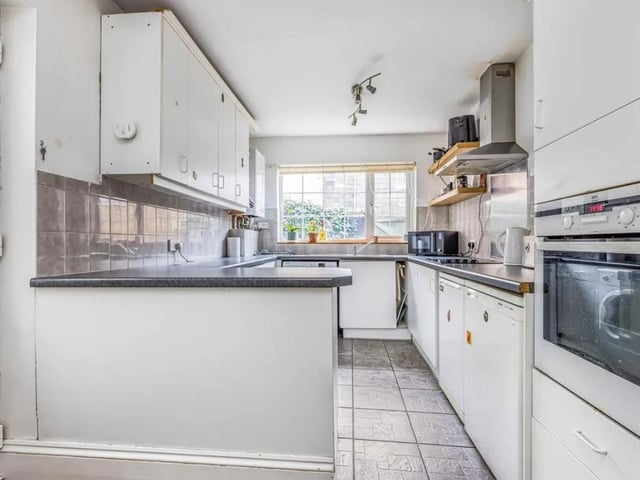 The listing says: "The property offers a courtyard garden at the rear. This outdoor provides residents with a private and tranquil space to unwind, enjoy outdoor meals, or simply soak up some fresh air."