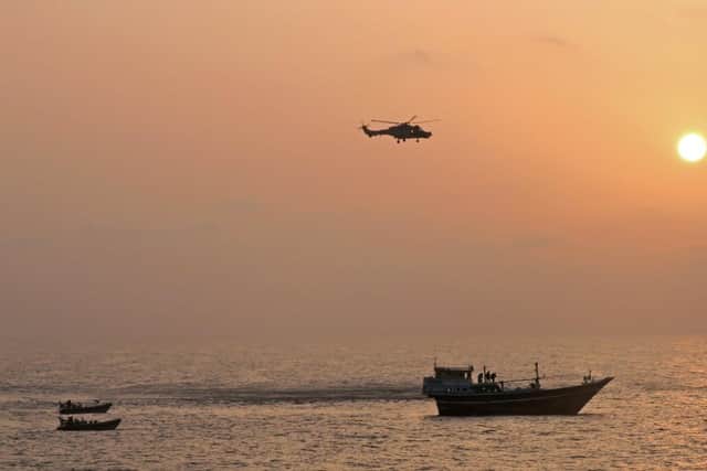 Montrose's Wildcat helicopter and sea boats strike at the dhow at dawn
Picture: Royal Navy