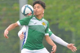 Moneyfields' Eric Kerage keeps his eye on the ball against Denmead. Picture by Martyn White