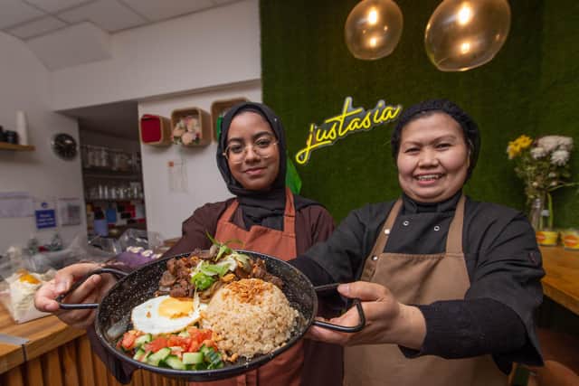 Staff Mahida Rahman and chef Maria Imperial with Beef Tapa

Picture: Habibur Rahman