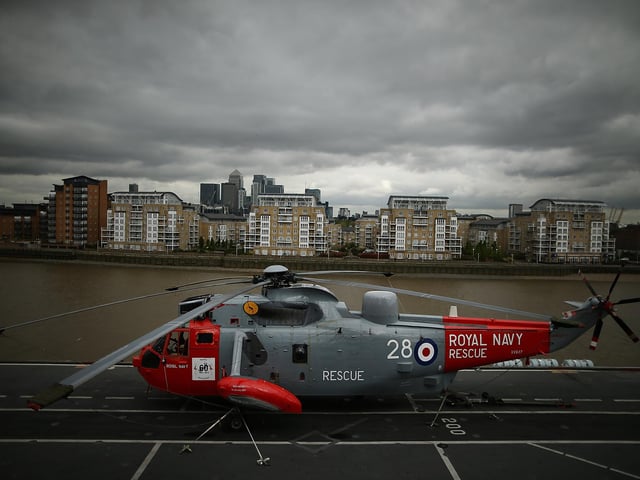 A Sea King helicopter rests on the flight deck of HMS Illustrious when it was docked in Greenwich on May 10, 2013. Photo by Dan Kitwood/Getty Images