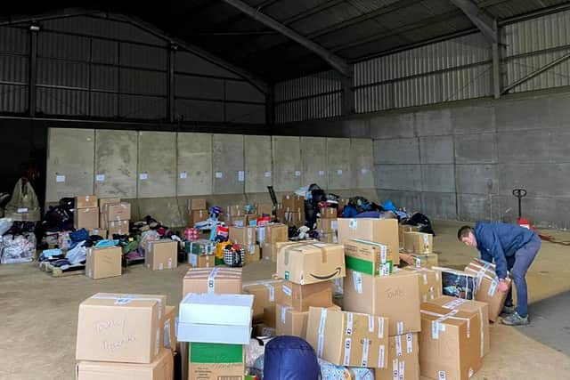 More Ukraine donations at farmer Ben Robinson's barn.