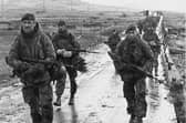 Royal Marines march into Port Stanley at the end of the war.