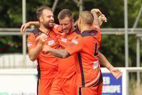Will this be a regular sight in the 2022/23 Wessex Premier season? Brett Pitman, left, is congratulated after scoring for AFC Portchester in a pre-season friendly. Picture by Dave Haines