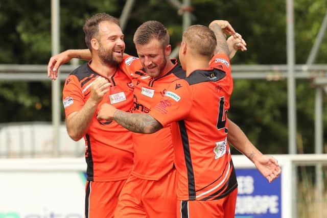 Will this be a regular sight in the 2022/23 Wessex Premier season? Brett Pitman, left, is congratulated after scoring for AFC Portchester in a pre-season friendly. Picture by Dave Haines