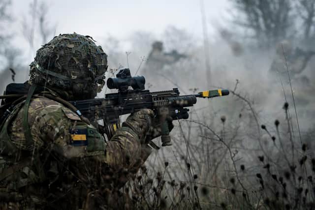 Troops from 4 PWRR fire and manoeuvre towards the enemy position. Photo: Sgt Nick Johns RLC / MoD Crown