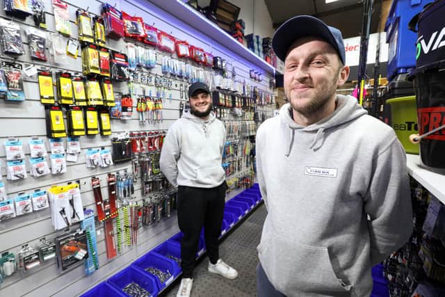 Ashley Dowdeswell, nearest camera, is a co-owner of Fishon Bait N Tackle, pictured with assistant Luke Choate
Picture: Chris Moorhouse (jpns 180621-22)