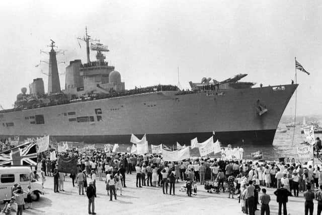 Entering the harbour is HMS Invincible getting a warm welcome back from the Falklands in 1982. The News PP4870