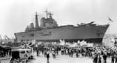 Entering the harbour is HMS Invincible getting a warm welcome back from the Falklands in 1982. The News PP4870