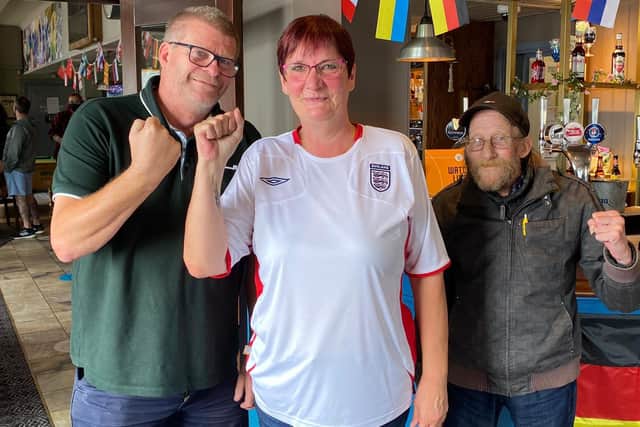 Gary Talbot, Sandi Talbot and Malcolm Ayres in the Star and Garter in Copnor before tonight's England-Denmark Euro 2020 semi-final 
Picture: Tom Cotterill