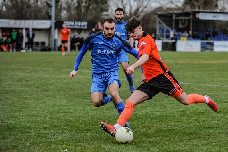 AFC Portchester (orange) v Christchurch. Picture by Daniel Haswell