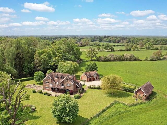 This home comes with five bedrooms, five bathrooms and four reception rooms.