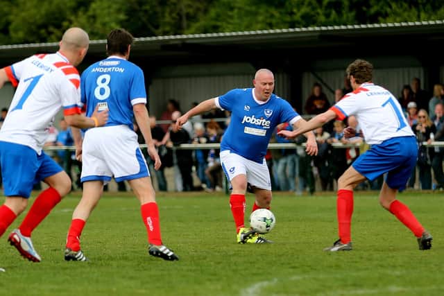 Stuart Doling still turns out for Pompey's Charity side. Here he's pictured with Darren Anderton in a Lee Rigby charity football match in April 2017. Picture: Simon Hill Photography.