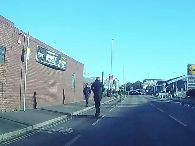 Dashcam shows Joseph Pedelty heading towards the red light.