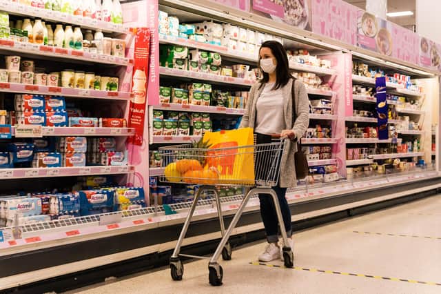 A shopper wearing a face covering in a Sainsbury's supermarket. Picture: Sainsbury's