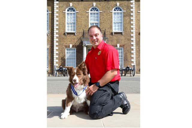 Zak, 14, a border collie with owner Kevin Saunders and wearing his PDSA Order of Merit medal at an awards ceremony at Armoury House, London Picture: PDSA/PA Wire