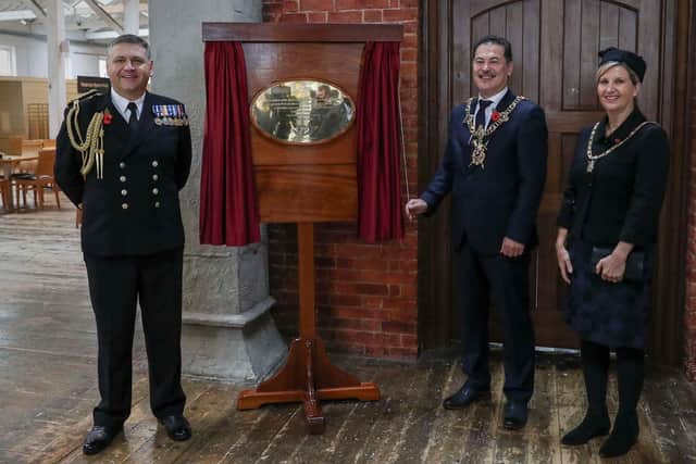 Naval base commander Commodore JJ Bailey with Portsmouth Lord Mayor Councillor Rob Wood and the lady mayoress during the unveiling ceremony at the dockyard last year. Photo: Royal Navy