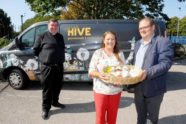 The launch of the Harvest Appeal, encouraging people to donate food tins.Pictured is: Father Bob White with Fratton residents Brian and Maggie Moles.Picture: Sarah Standing (140920-3990)