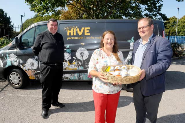 The launch of the Harvest Appeal, encouraging people to donate food tins.
Pictured is: Father Bob White with Fratton residents Brian and Maggie Moles.
Picture: Sarah Standing (140920-3990)