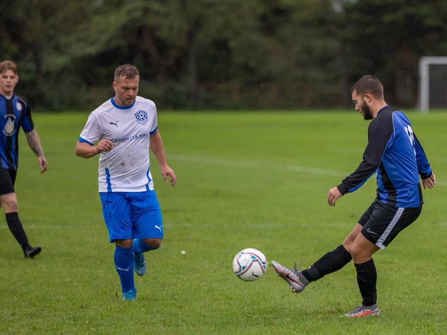 Padnell (blue) v AC Copnor Reserves. Picture by Mike Cooter