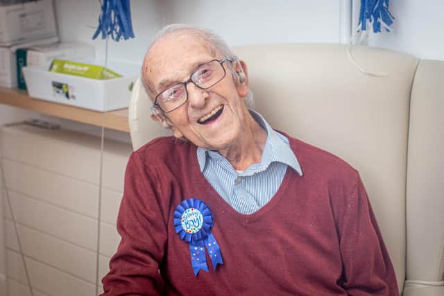 Bob Phillips is celebrating his 106th birthday today at The Haven care home, and will receive his second Pfizer jab on the same day
Pictured: Bob Phillips in a Visiting Pod at The Haven care home, Drayton, Portsmouth on 17 March 2021.
Picture: Habibur Rahman