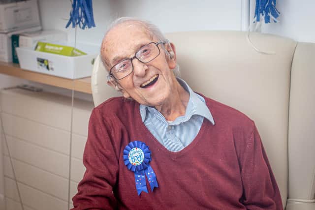 Bob Phillips is celebrating his 106th birthday today at The Haven care home, and will receive his second Pfizer jab on the same day

Pictured: Bob Phillips in a Visiting Pod at The Haven care home, Drayton, Portsmouth on 17 March 2021.

Picture: Habibur Rahman