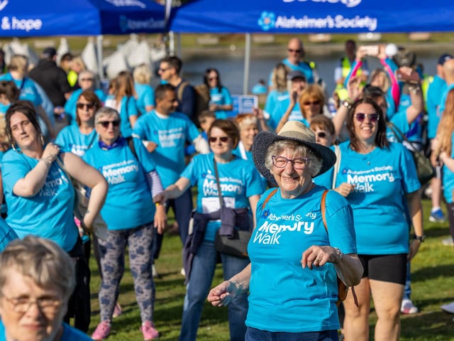 A mass Zumba session to warm up the 900 participants of the Alzheimers Memory Walk around Canoe Lake. 
Picture: Mike Cooter