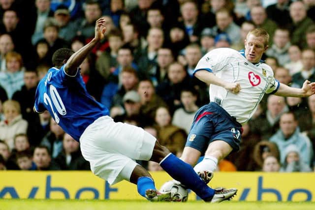 John Curtis challenges Everton's Joseph Yobo during a Premier League game in March 2004. Picture: Dave Thompson