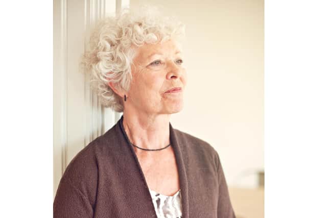 A generic stock photo of a mature woman at home alone. Credit: Alamy/PA