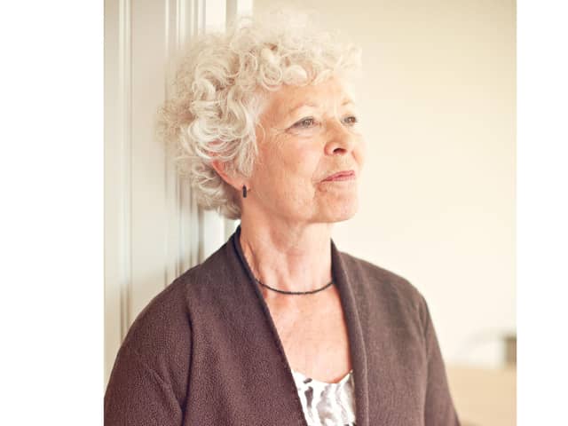A generic stock photo of a mature woman at home alone. Credit: Alamy/PA