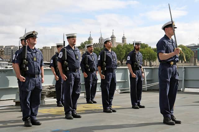 Pictured: Ships Company of HMS Severn carrying out drill training in preparation for the recommissioning ceremony outboard HMS Belfast on the River Thames near Tower Bridge 28th August 2021.