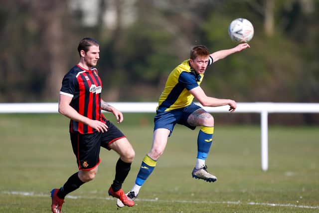 Moneyfields' Liam Kyle, right, saw a first half penalty saved by Locks Heath keeper Joe Hunt. Picture: Dave Bodymore