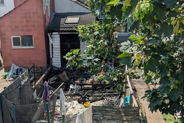 Damage to the Winchester Road property as seen from behind.