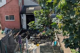 Damage to the Winchester Road property as seen from behind.