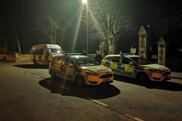 Police in Ann's Hill Cemetery in Gosport on Thursday, March 25 following vandalism. Picture: Gosport police