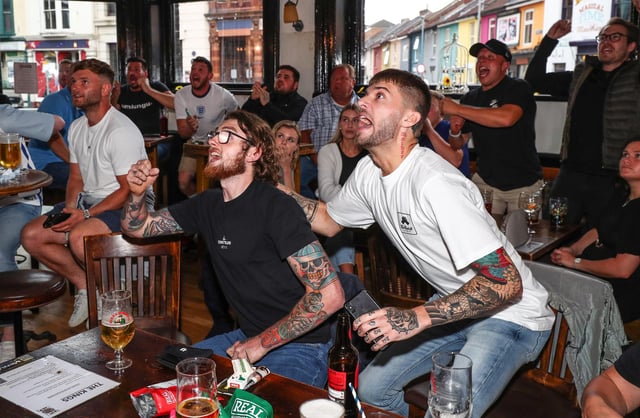 England fans watch England beat Germany 2-0 in the Euros 2020.
Fans pictured in The Kings pub celebrating as England score their first goal.
Picture: Stuart Martin (220421-7042)