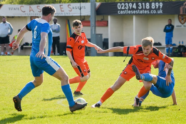 Action from the 2-2 draw between AFC Portchester under-23s (orange and black kit) and Liphook United. Picture: Keith Woodland (150421-970)