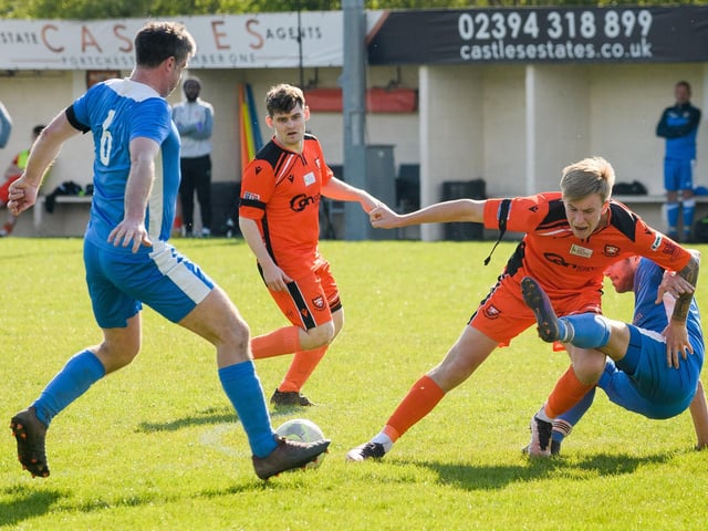 Action from the 2-2 draw between AFC Portchester under-23s (orange and black kit) and Liphook United. Picture: Keith Woodland (150421-970)