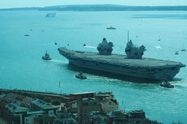 Royal Navy aircraft carrier HMS Prince of Wales leaving Portsmouth on Saturday, taken from the Spinnaker tower Picture: @CNPics_